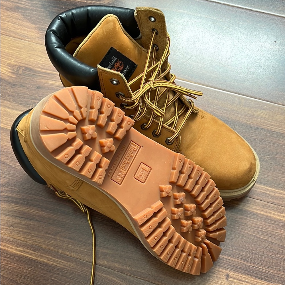 Timberland Tan and Black High-Top Boots with Aggressive Tread